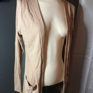Khaki colored cardigan with pockets